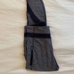 Grey Lululemon leggings with mesh panels